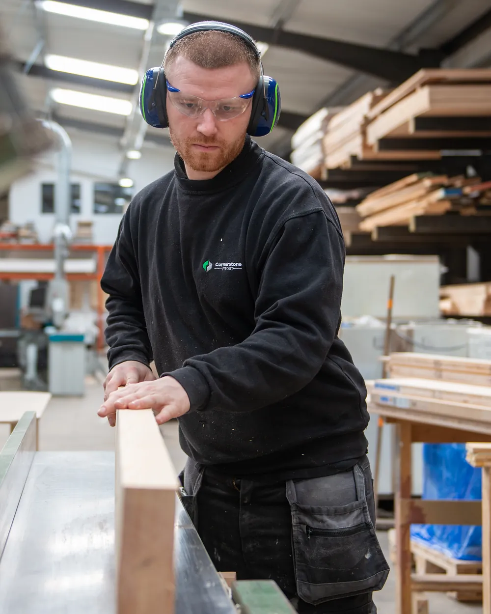 Cornerstone joiner machining timber in the Lancashire workshop