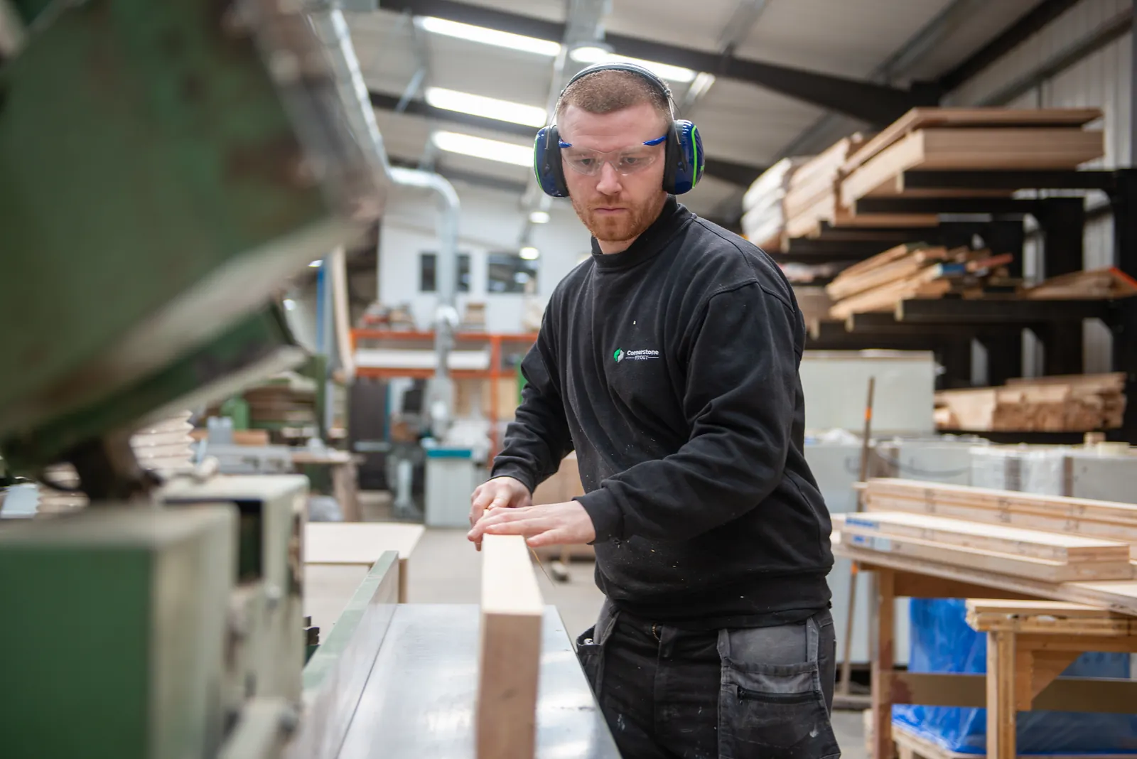 Feeding timber through the planer