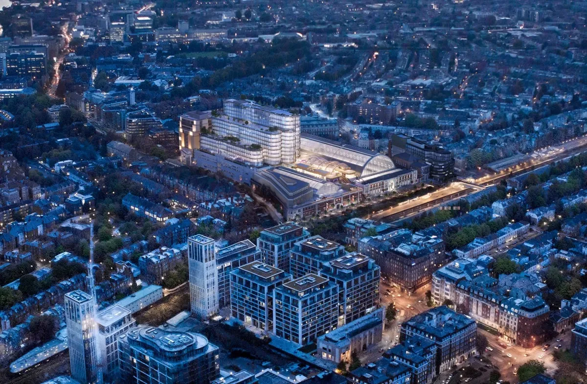 The £1.3 billion Olympia London redevelopment at dusk (CGI)