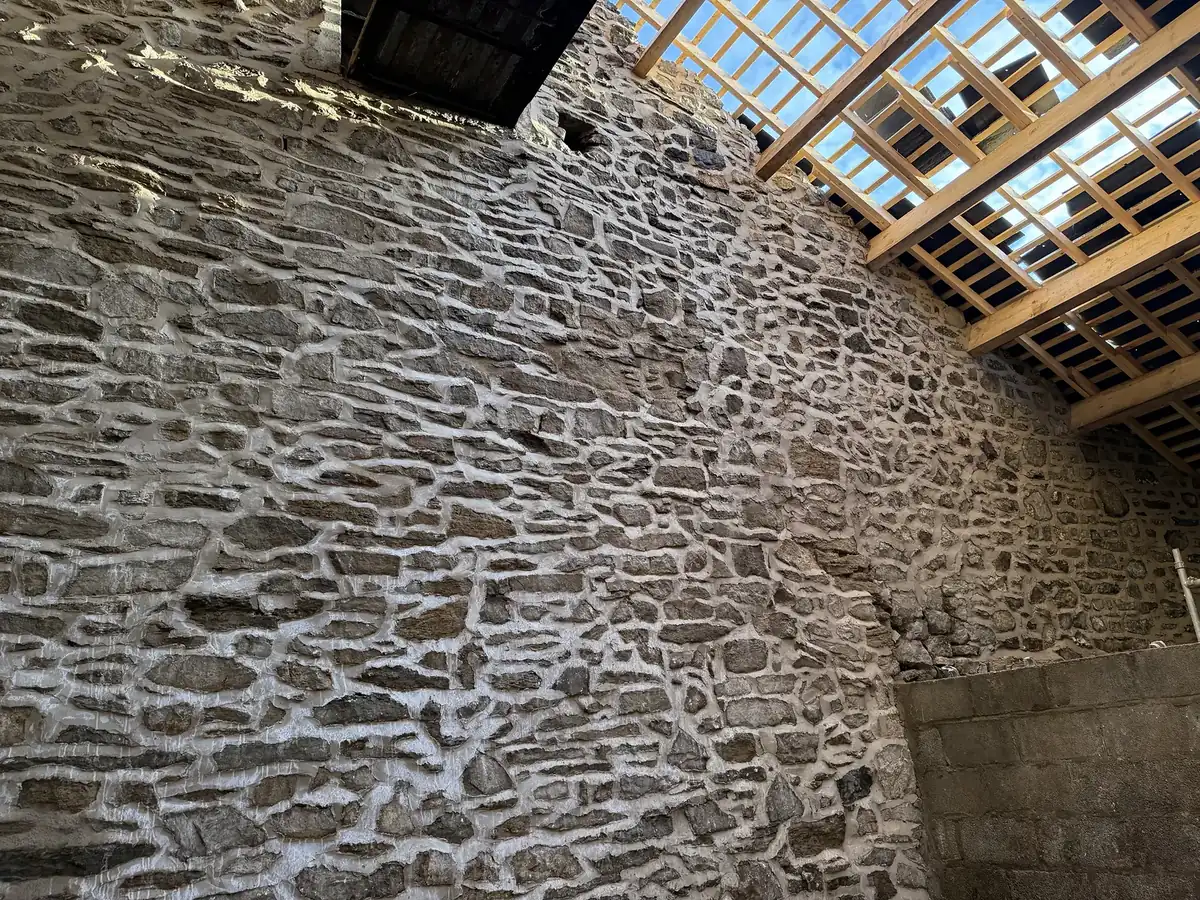 Original rubble stonework, cleaned and repointed